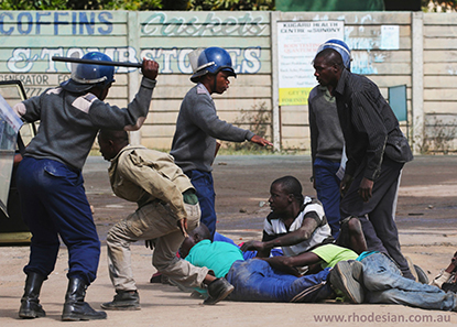 Protesters beaten by Zimbabwe riot police